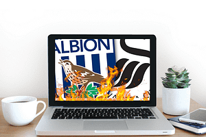 laptop with west brom and swansea football emblems on screen