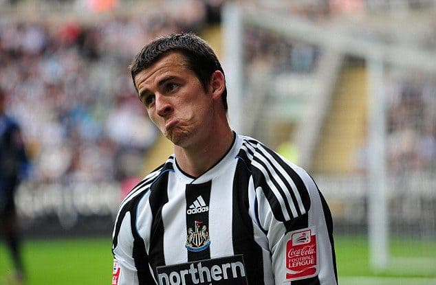 Joey Barton looks sad while playing for Newcastle United.