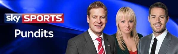 Pundits Ed Chamberlin, Alex Hammond and Jamie Redknapp standing next to the Sky Sports logo.