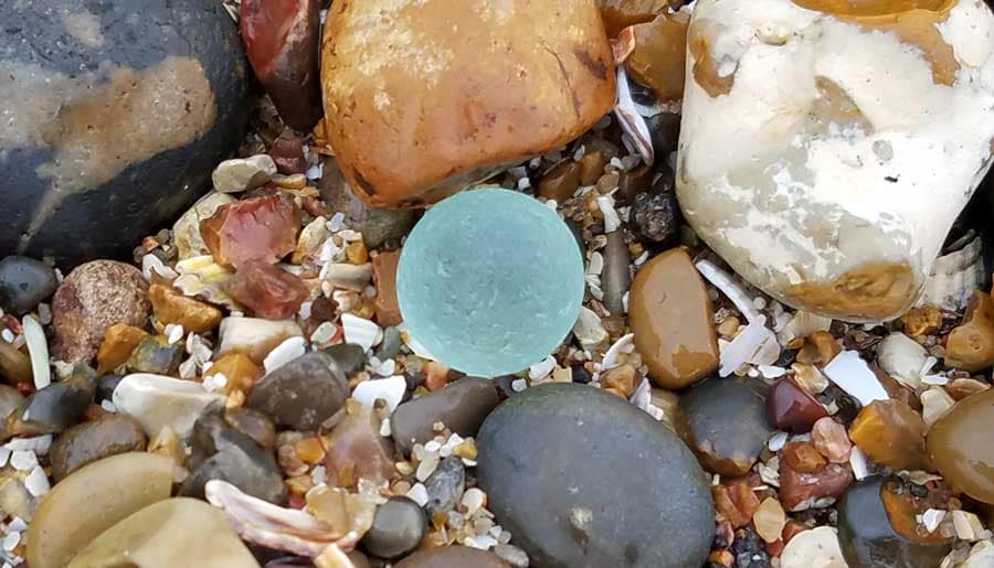 Aqua sea glass marble found at Minster-on-Sea, United Kingdom