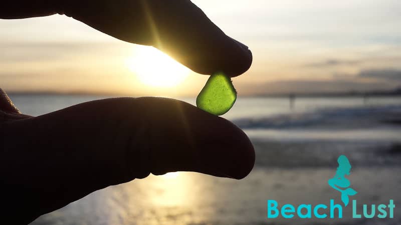 Green sea glass at sunset, found on Southbourne Beach, Bournemouth