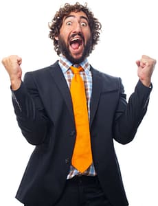 Man who is punching the air and celebrating winning