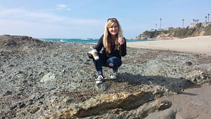 Collecting sea glass at Laguna Beach, California