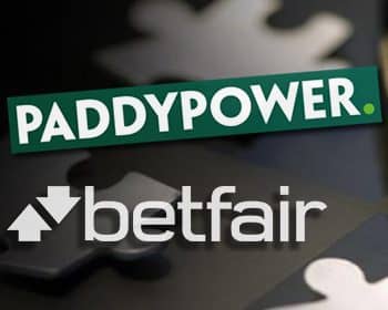 Paddy Power and Betfair logos pictures together following the announcement of a merger deal between the two companies.