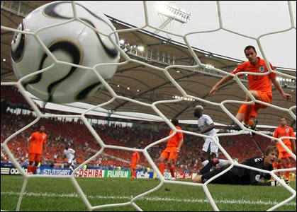 A football team scores a goal.