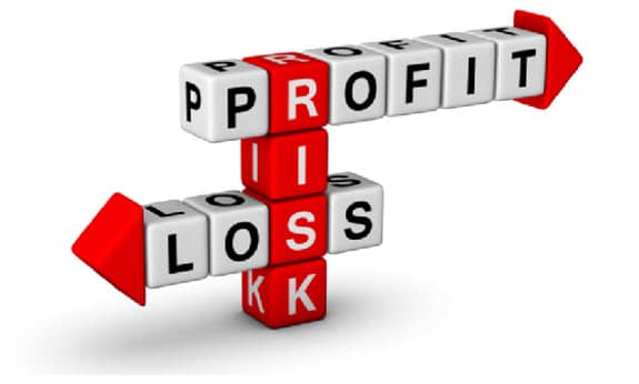A stack of cubes which spell out "profit", "loss" and "risk".