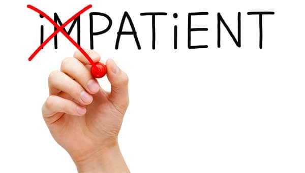 Red marker pen changing the word "impatient" to "patient"