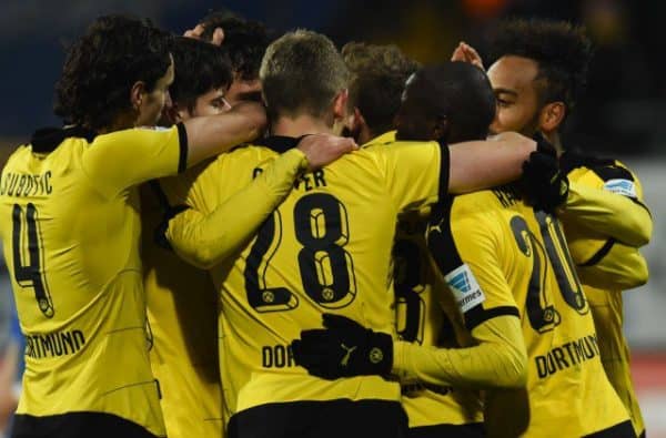 Borussia Dortmund celebrate after scoring in their 8-4 win over Legia Warsaw in the Champions League.