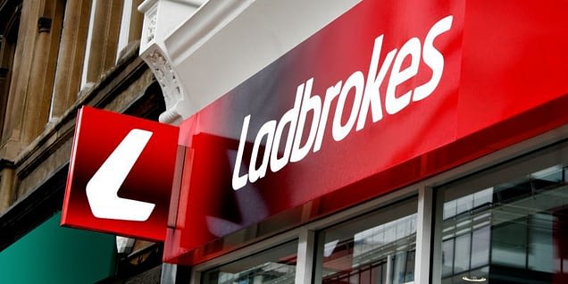 The Ladbrokes sign and logo on one of their many high street betting shops.