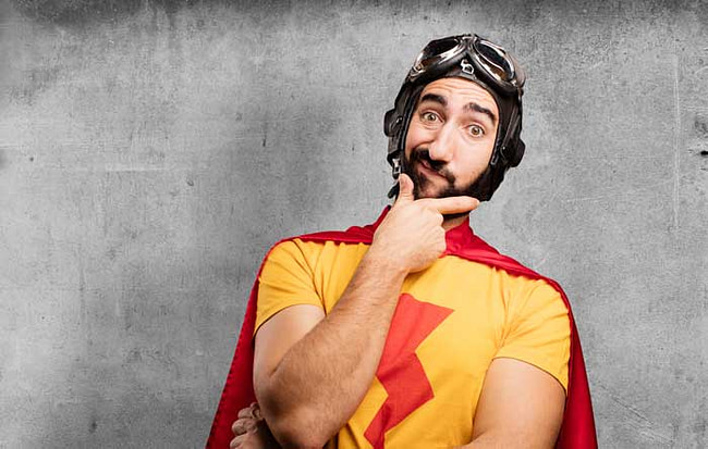 Man in a superhero costume with a questioning look.