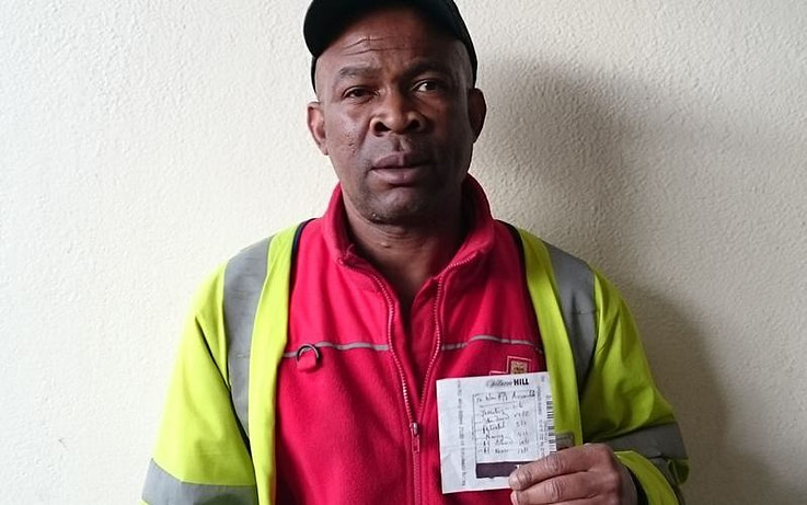 Unlucky punter Gary Garan holds a betting slip.