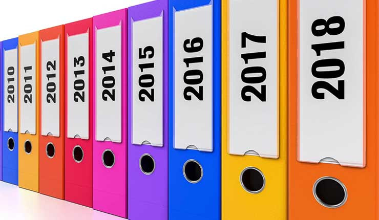 A row of folders numbered from 2010 to 2018