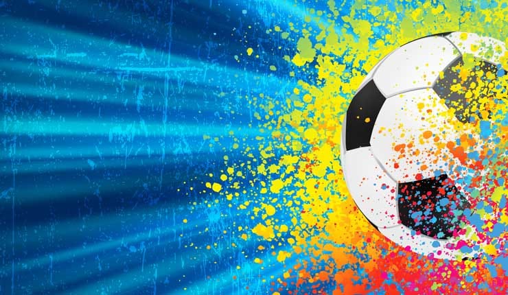 A football and a colourful explosion of paint