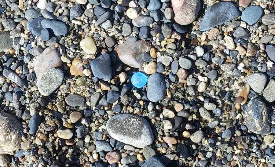 Aqua sea glass marble found at Capistrano Beach Park