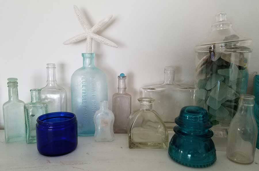 Collection of vintage glass bottles.